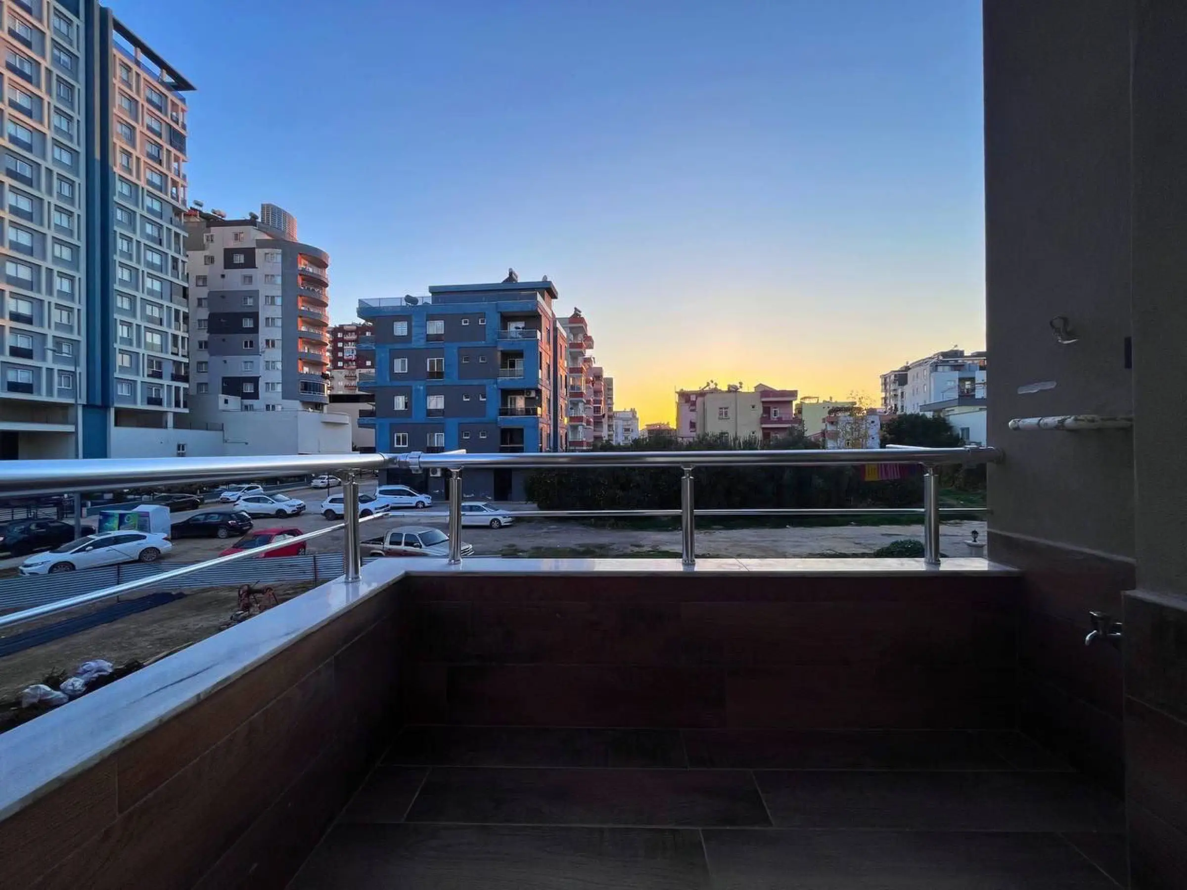 The balcony at sunset, looking over the neighbourhood